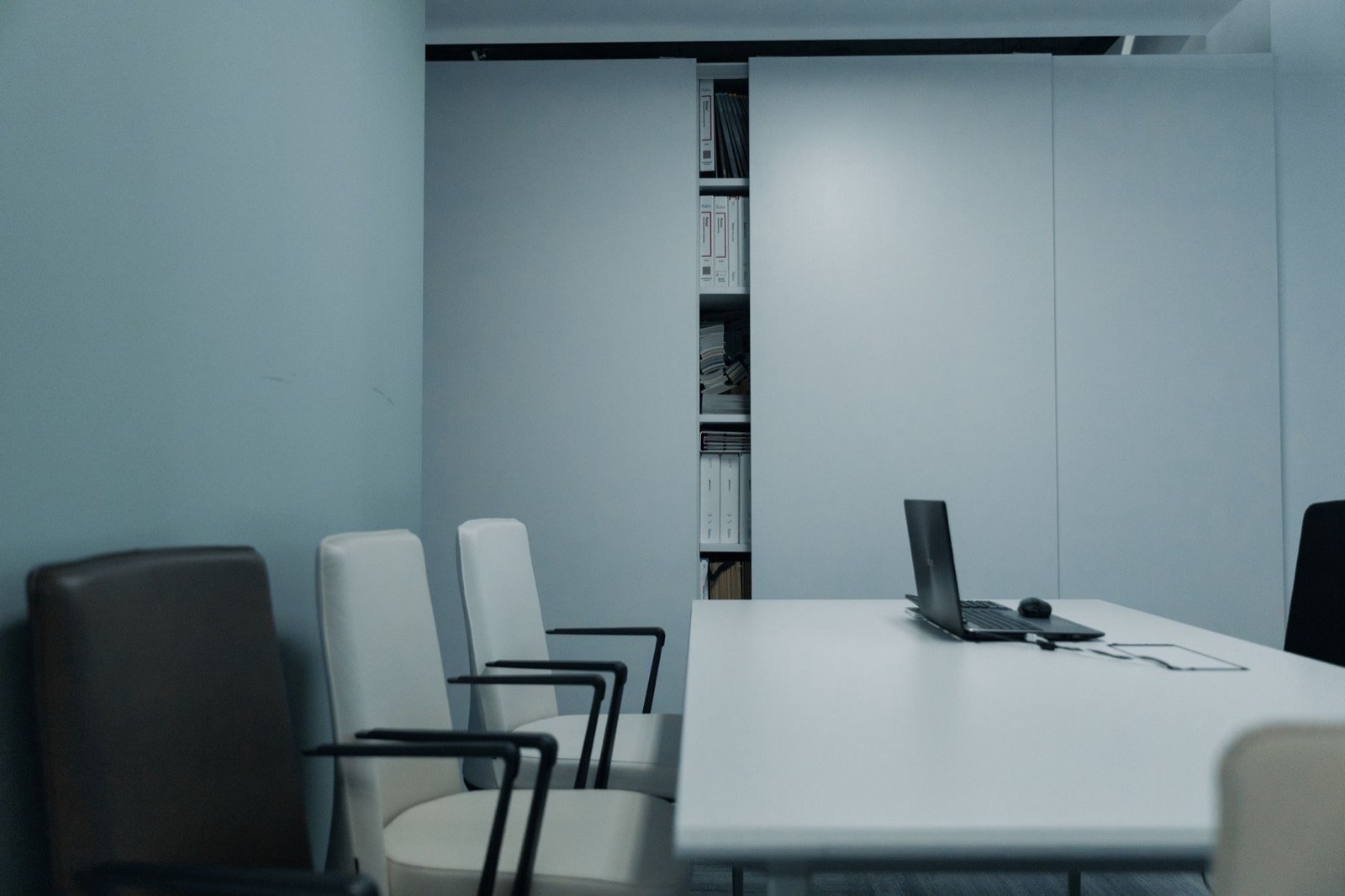 A working meeting over documents in an office.