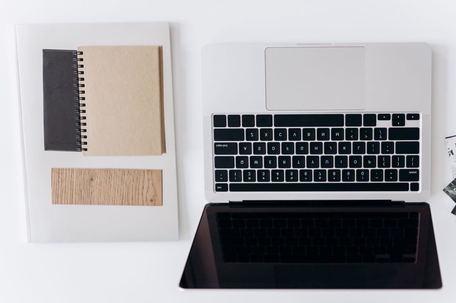 A desk with corporate paperwork and a laptop during a tax filing period.