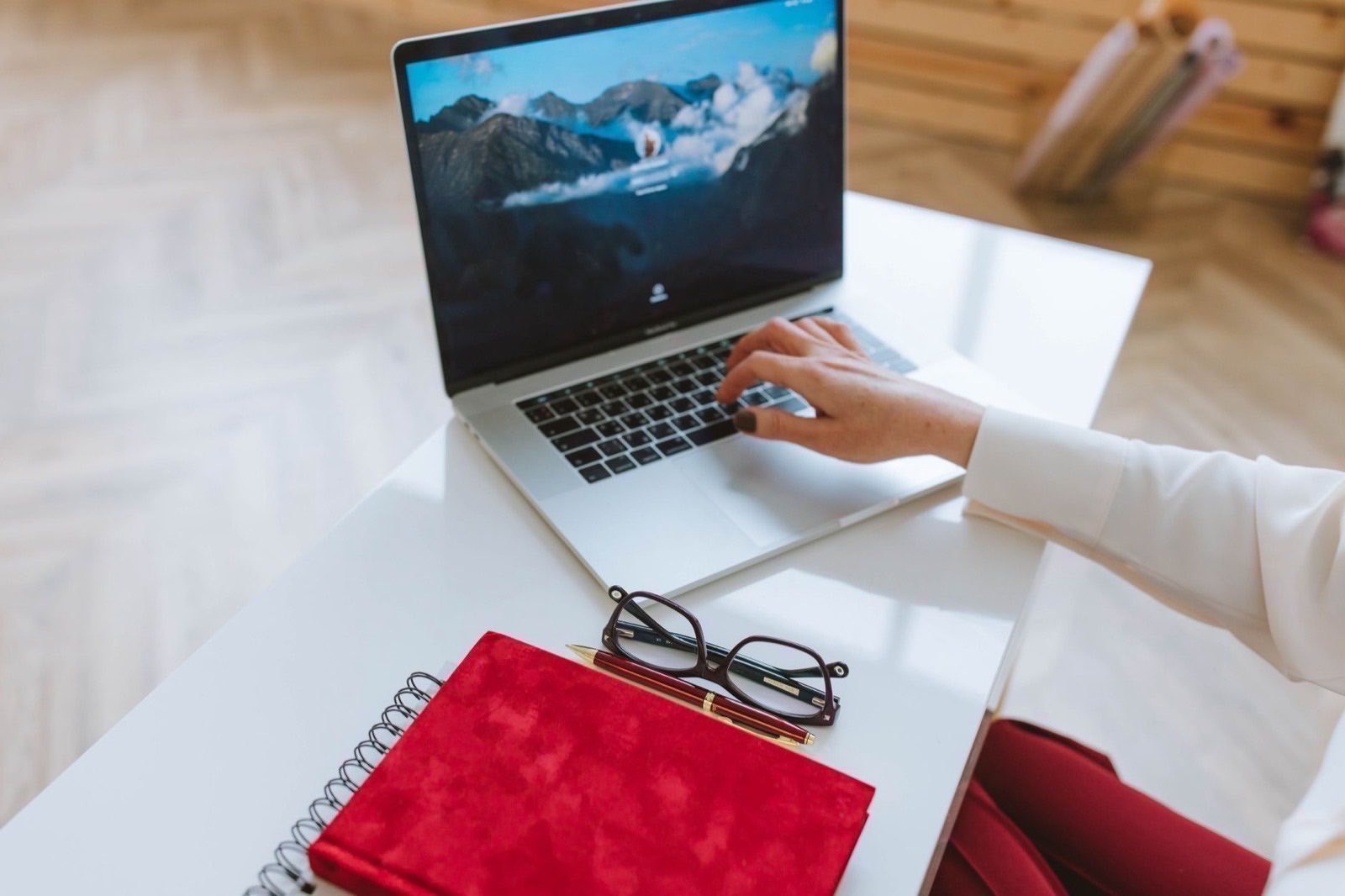 Brand material laid out for review before a trademark application is prepared.