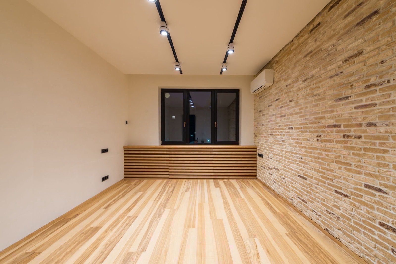 An empty office room with no one present during working hours.